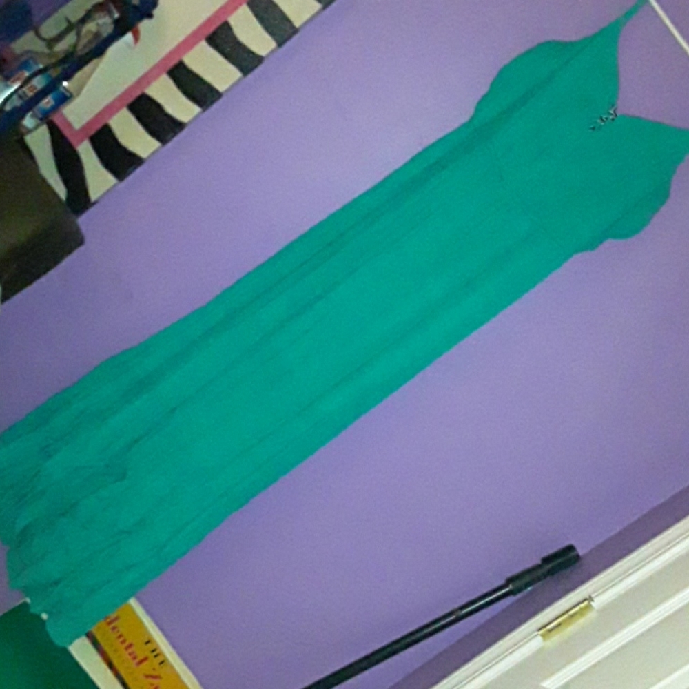 A teal floor length dress